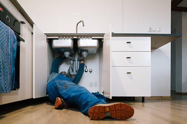 Professional Drain Cleaning technician working in Vaughn, WA